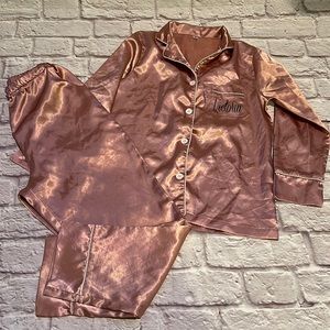 Girls satin pajamas with the name “Victoria”